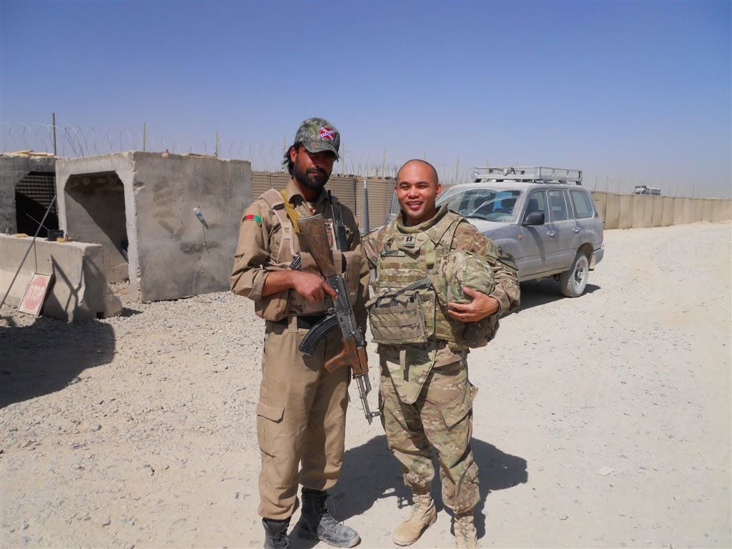 Peter J. Santos with an Afghan National Police officer