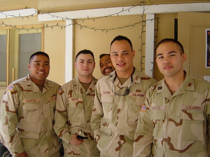 Peter J. Santos with fellow soldiers on deployment, two of them also named Santos