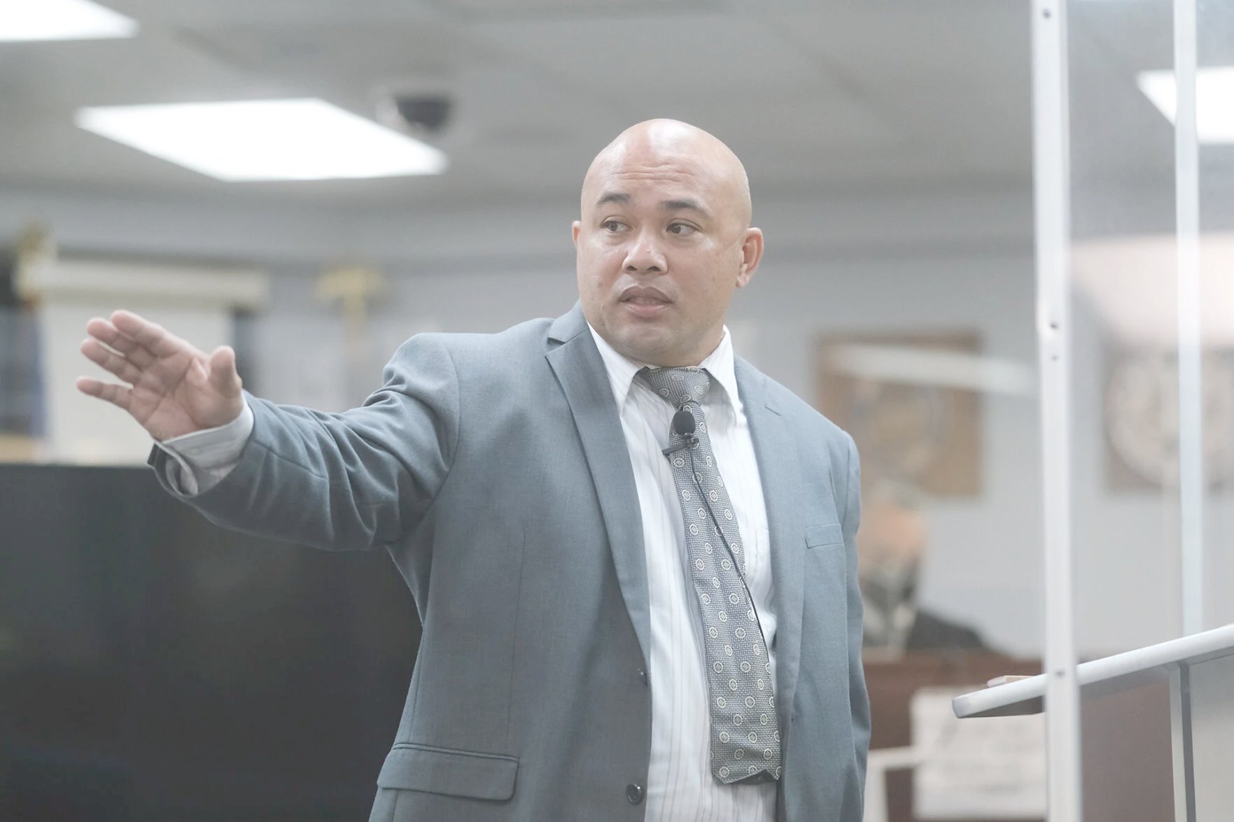 Peter J. Santos addressing a courtroom on Guam